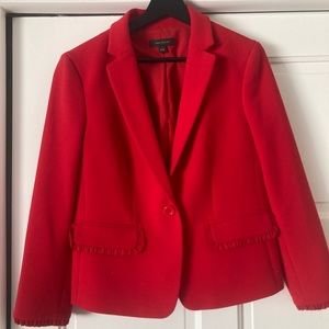 Red Ann Taylor blazer with ruffle cuffs and pockets